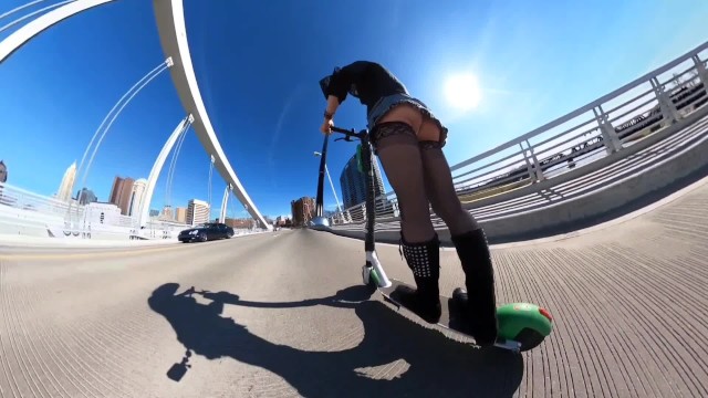 Short Skirt On A Scooter