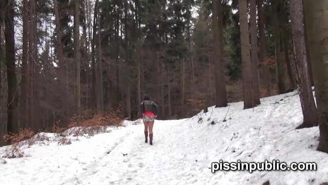 Girls In Need Skate Around In The Snow To Find A Proper Place To Have A Pee